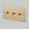 Three Gang 2 Way Light Switch in Brass with Linear Knurled Toggles