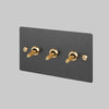 Three Gang 2 Way Light Switch in Smoked Bronze with Brass Linear Knurled Toggles