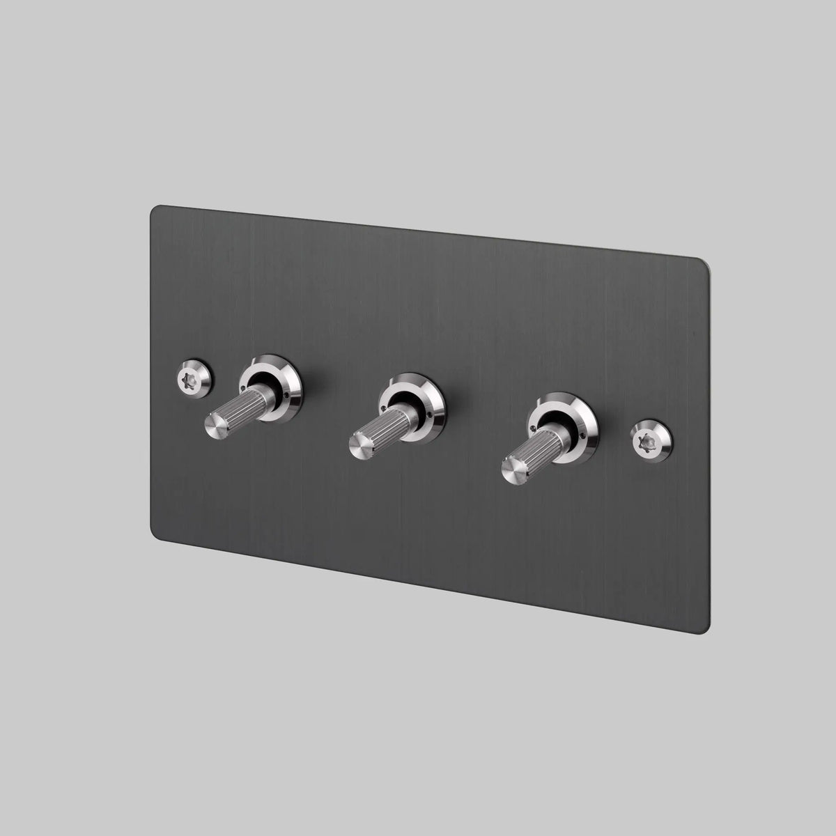 Buster + Punch three gang 2 way light switch in smoked bronze with steel linear knurled toggles