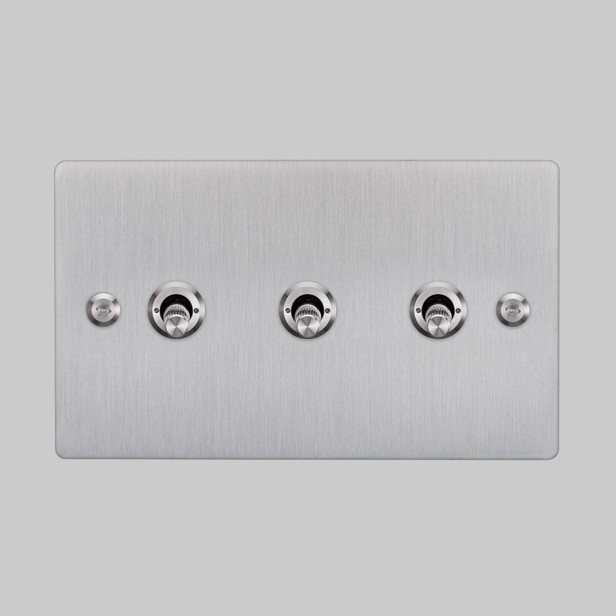 Three Gang 2 Way Light Switch in Steel with Linear Knurled Toggles