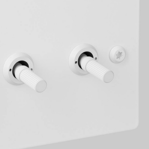 Four Gang 2 Way Light Switch in White with Linear Knurled Toggles