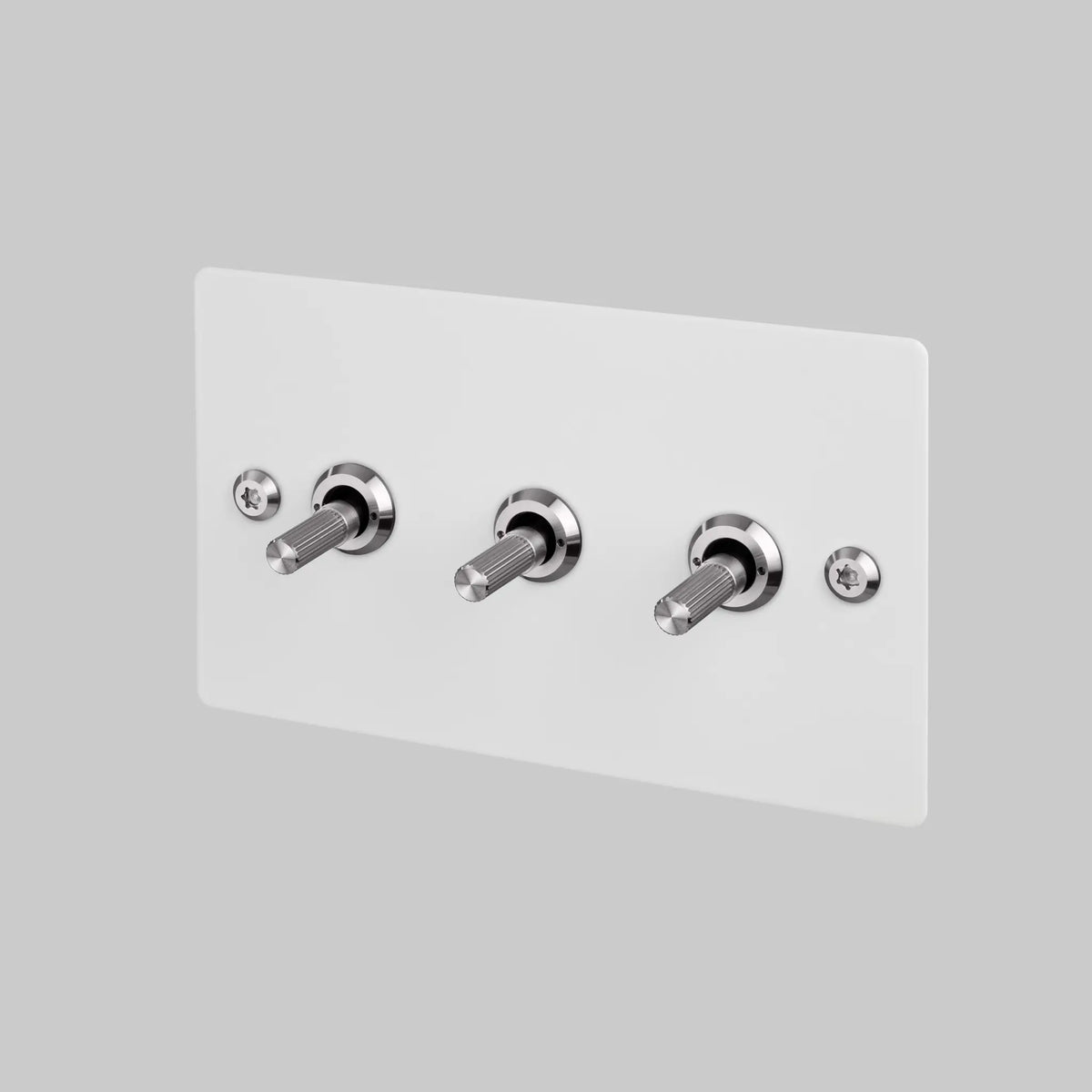 Three Gang 2 Way Light Switch in White with Steel Linear Knurled Toggles