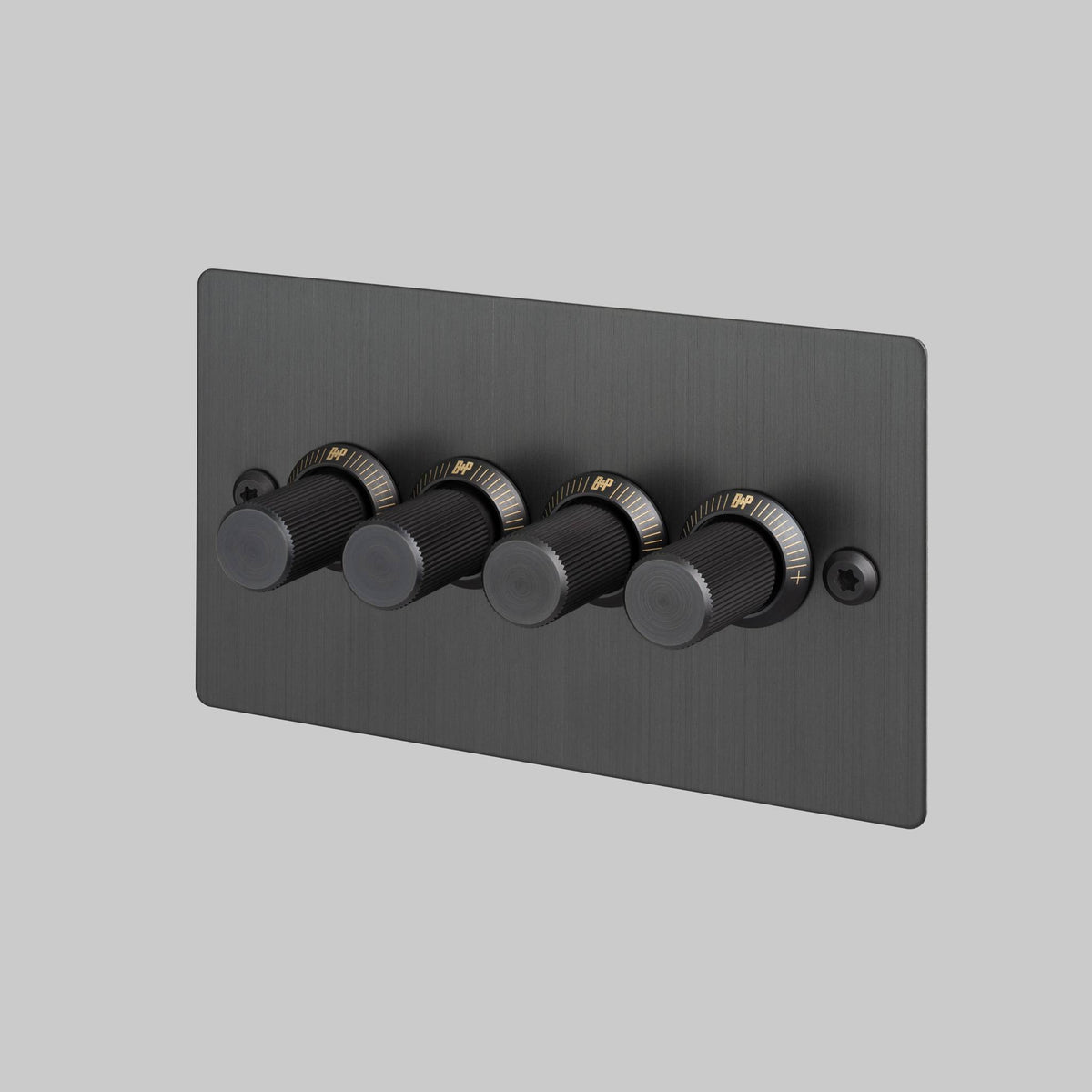 Four gang dimmer switch in black with gold details