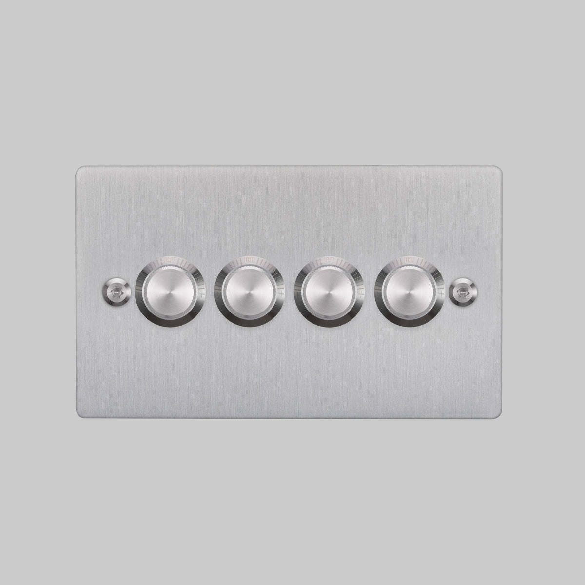 Brushed chrome 4-gang dimmer switch on a light grey background