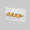 Four Gang 2 Way Dimmer Light Switch in White with Brass Linear Knurled Knobs