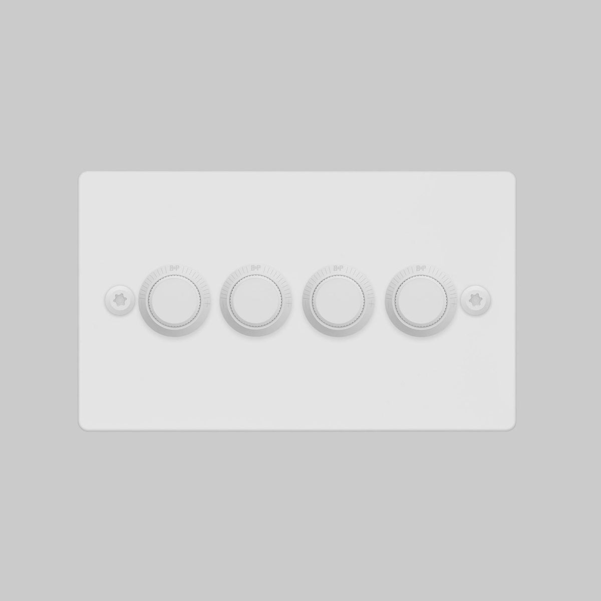 White 4-gang dimmer switch with four circular knobs and two visible screws