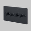 Four Gang 2 Way Light Switch in Black with Linear Knurled Toggles