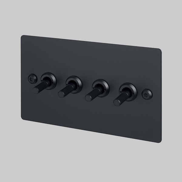 Four Gang 2 Way Light Switch in Black with Linear Knurled Toggles