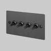 Four Gang 2 Way Light Switch in Smoked Bronze with Linear Knurled Toggles