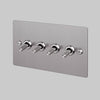 Four Gang 2 Way Light Switch in Steel with Linear Knurled Toggles