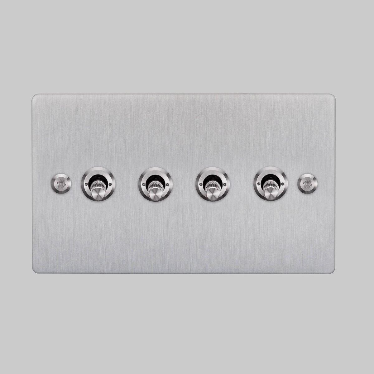 Four Gang 2 Way Light Switch in Steel with Linear Knurled Toggles