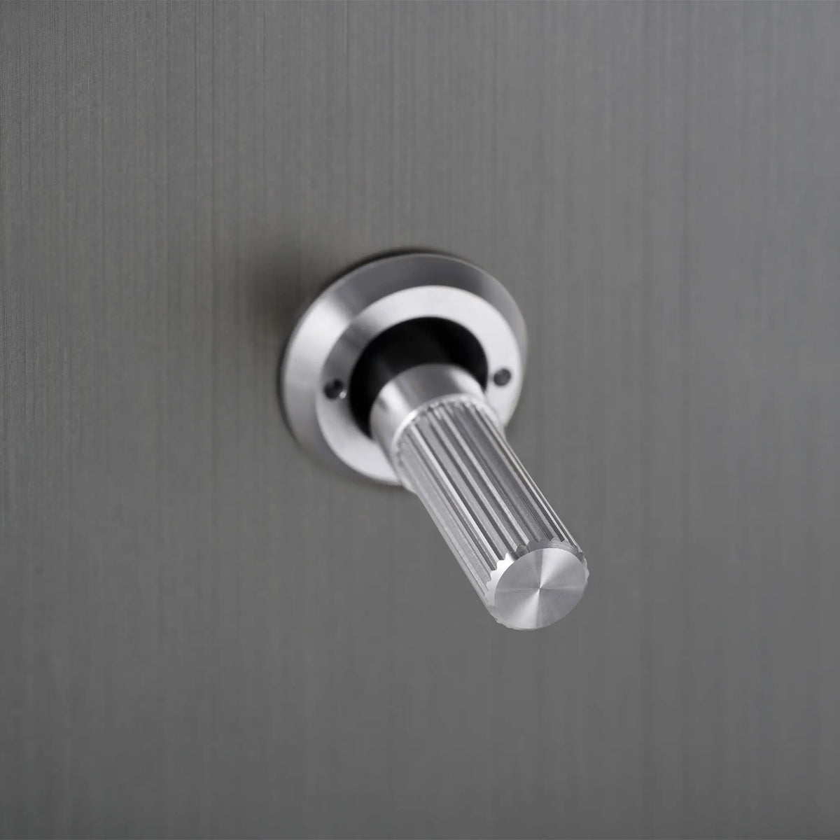Buster and Punch smoked bronze light switch with steel linear knurled toggle