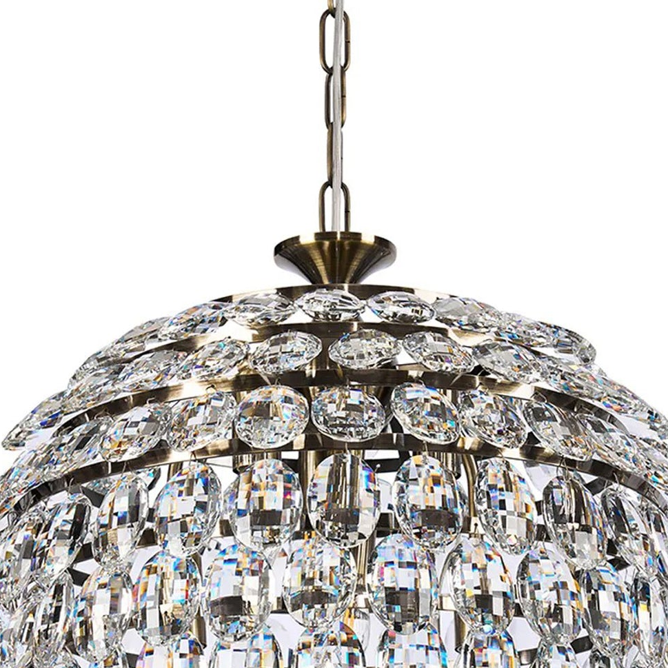 Coniston 6 Light Clear Crystal Pendant Light in Antique Brass