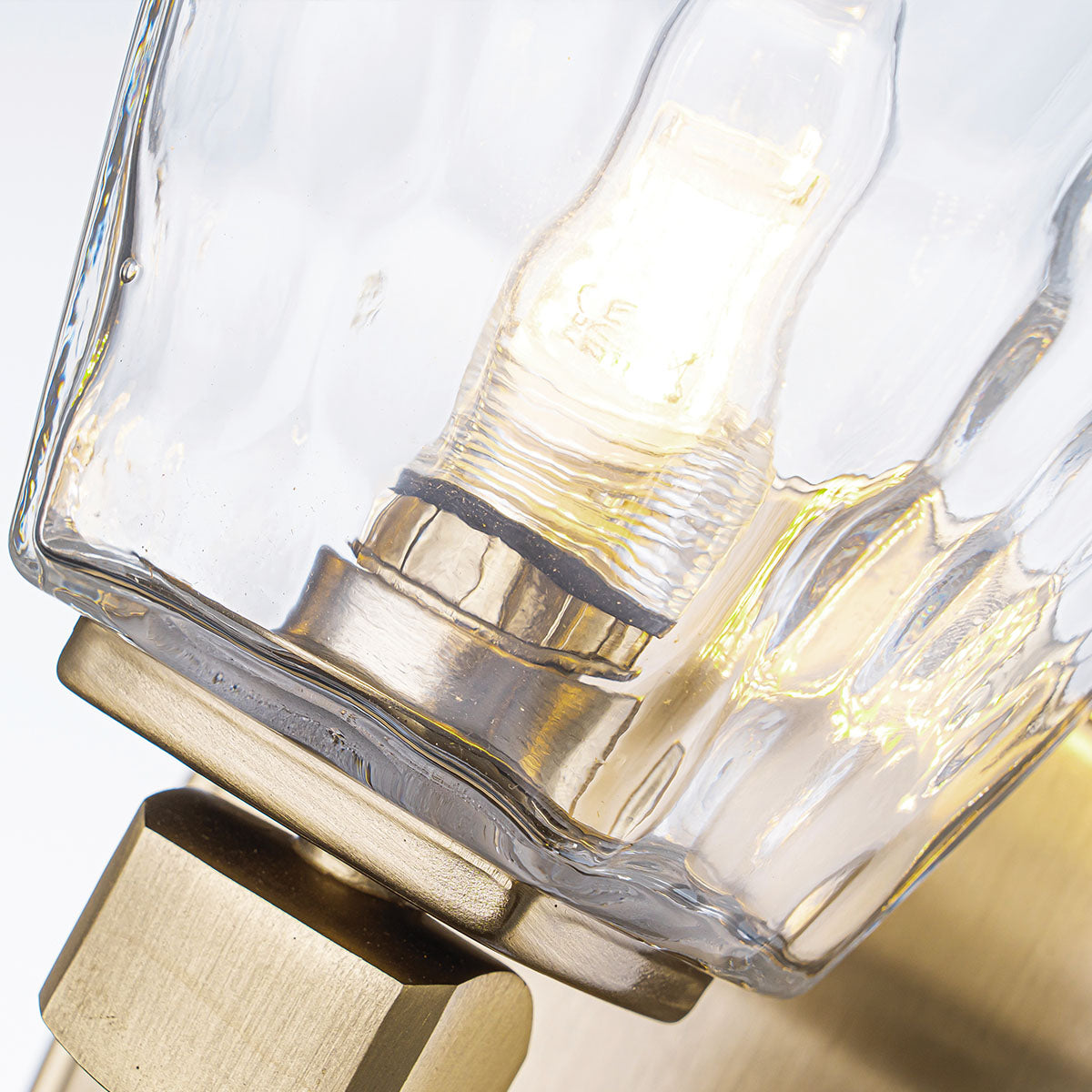 Marant IP44 Wall Light in Champagne Bronze and Clear Water Glass Shade