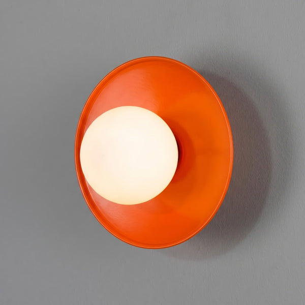 Mullan Aosta orange brass disc bathroom wall light with opal glass globe