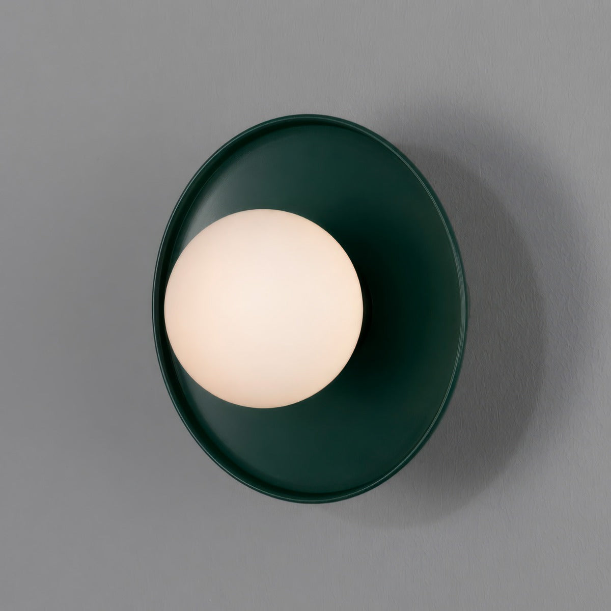 Aosta IP65 Brass Disc Bathroom Wall Light in Racing Green with Opal Glass Globe