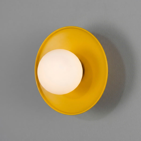 Aosta IP65 Brass Disc Bathroom Wall Light in Yellow with Opal Glass Globe