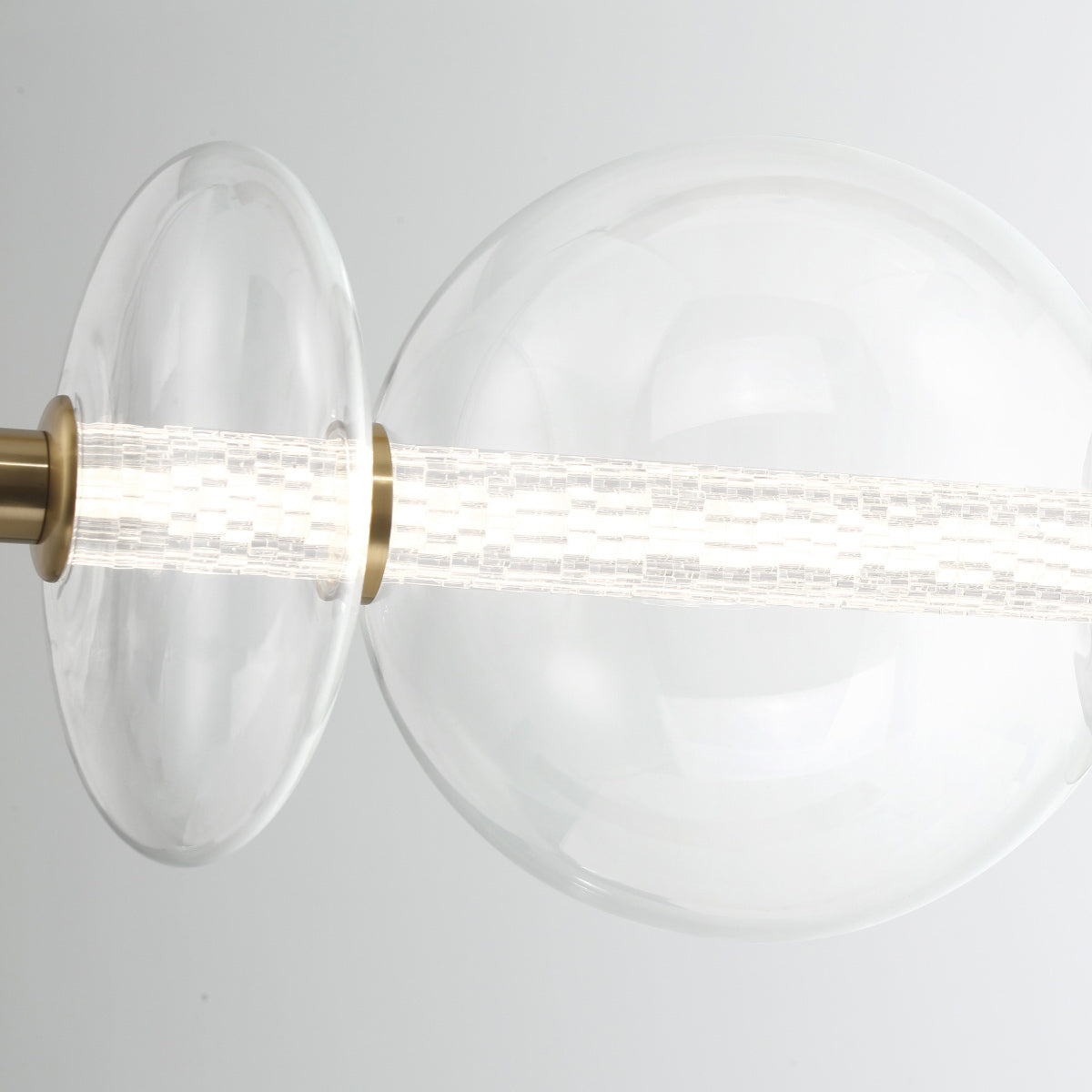 Atomo IP44 Seven LED Linear Pendant in Brushed Gold with Clear Glass Globes