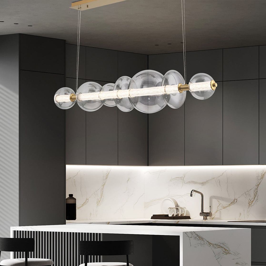 Atomo IP44 Seven LED Linear Pendant in Brushed Gold with Clear Glass Globes