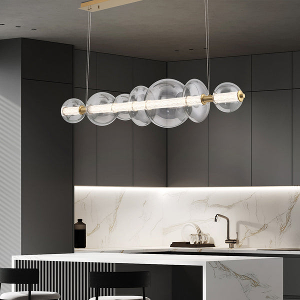 Atomo IP44 Seven LED Linear Pendant in Brushed Gold with Clear Glass Globes