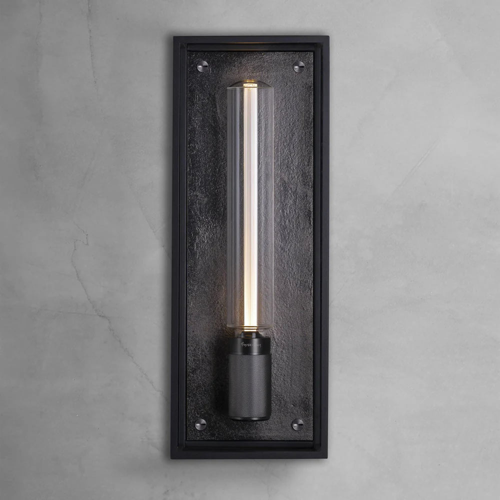Black rectangular wall sconce with a vertical clear glass tube light