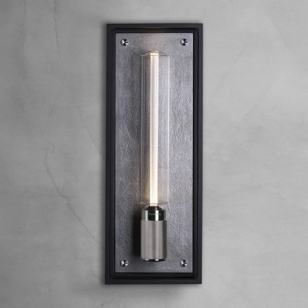 Rectangular wall sconce with a black frame, a dark grey textured backplate, and a vertical clear glass tube light